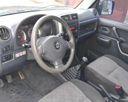 Черный Сузуки Джимни, объемом двигателя 1.3 л и пробегом 225 тыс. км за 6500 $, фото 11 на Automoto.ua