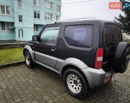 Чорний Сузукі Джімні, об'ємом двигуна 1.3 л та пробігом 164 тис. км за 7450 $, фото 11 на Automoto.ua