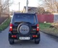 Черный Сузуки Джимни, объемом двигателя 1.3 л и пробегом 225 тыс. км за 6500 $, фото 7 на Automoto.ua
