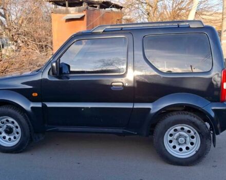 Черный Сузуки Джимни, объемом двигателя 1.3 л и пробегом 225 тыс. км за 6500 $, фото 9 на Automoto.ua