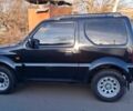 Черный Сузуки Джимни, объемом двигателя 1.3 л и пробегом 225 тыс. км за 6500 $, фото 9 на Automoto.ua