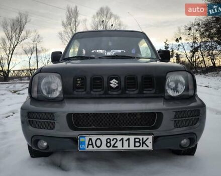 Чорний Сузукі Джімні, об'ємом двигуна 1.3 л та пробігом 163 тис. км за 7700 $, фото 4 на Automoto.ua