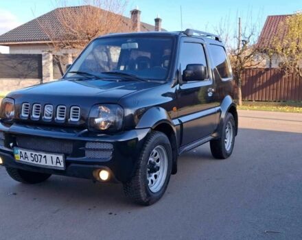 Черный Сузуки Джимни, объемом двигателя 1.3 л и пробегом 225 тыс. км за 6500 $, фото 4 на Automoto.ua