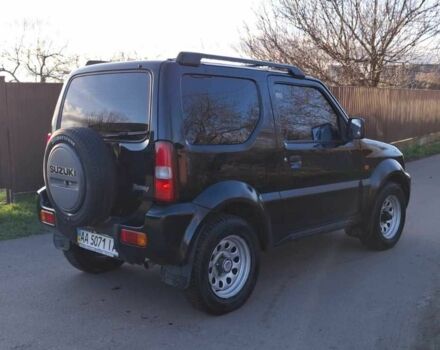 Черный Сузуки Джимни, объемом двигателя 1.3 л и пробегом 225 тыс. км за 6500 $, фото 6 на Automoto.ua