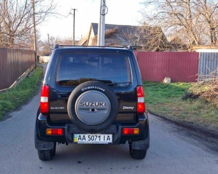 Черный Сузуки Джимни, объемом двигателя 1.3 л и пробегом 225 тыс. км за 6500 $, фото 7 на Automoto.ua
