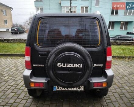 Чорний Сузукі Джімні, об'ємом двигуна 1.3 л та пробігом 164 тис. км за 7450 $, фото 9 на Automoto.ua