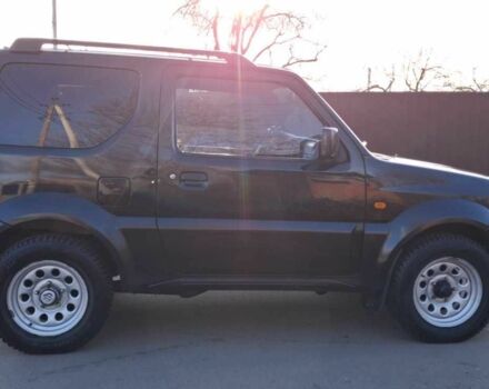 Черный Сузуки Джимни, объемом двигателя 1.3 л и пробегом 225 тыс. км за 6500 $, фото 5 на Automoto.ua