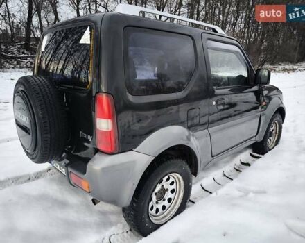 Чорний Сузукі Джімні, об'ємом двигуна 1.3 л та пробігом 163 тис. км за 7700 $, фото 8 на Automoto.ua