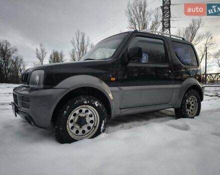 Чорний Сузукі Джімні, об'ємом двигуна 1.3 л та пробігом 163 тис. км за 7700 $, фото 1 на Automoto.ua