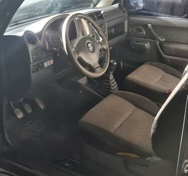 Сузуки Джимни 2008 в Обухове на Automoto.ua Черный Сузуки Джимни, объемом двигателя 1.3 л и пробегом 224 тыс. км за 7200 $, фото 6 на Automoto.ua