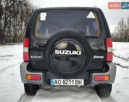 Чорний Сузукі Джімні, об'ємом двигуна 1.3 л та пробігом 163 тис. км за 7700 $, фото 9 на Automoto.ua