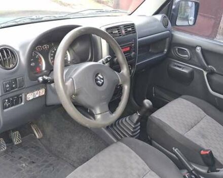 Черный Сузуки Джимни, объемом двигателя 1.3 л и пробегом 225 тыс. км за 6500 $, фото 11 на Automoto.ua