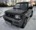 Чорний Сузукі Джімні, об'ємом двигуна 1.3 л та пробігом 163 тис. км за 7700 $, фото 3 на Automoto.ua