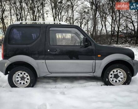 Чорний Сузукі Джімні, об'ємом двигуна 1.3 л та пробігом 163 тис. км за 7700 $, фото 7 на Automoto.ua
