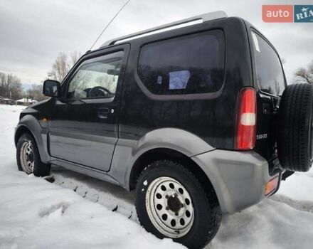 Чорний Сузукі Джімні, об'ємом двигуна 1.3 л та пробігом 163 тис. км за 7700 $, фото 10 на Automoto.ua