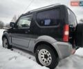 Чорний Сузукі Джімні, об'ємом двигуна 1.3 л та пробігом 163 тис. км за 7700 $, фото 10 на Automoto.ua