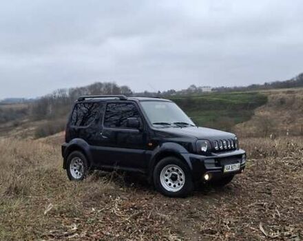 Черный Сузуки Джимни, объемом двигателя 1.3 л и пробегом 225 тыс. км за 6500 $, фото 2 на Automoto.ua