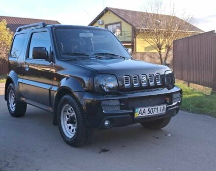 Черный Сузуки Джимни, объемом двигателя 1.3 л и пробегом 225 тыс. км за 6500 $, фото 2 на Automoto.ua