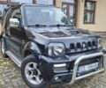 Черный Сузуки Джимни, объемом двигателя 1.5 л и пробегом 130 тыс. км за 1699 $, фото 4 на Automoto.ua