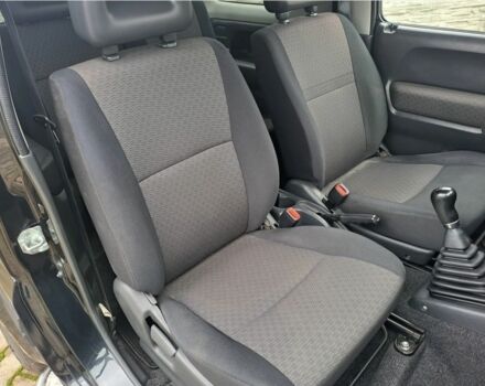 Черный Сузуки Джимни, объемом двигателя 1.5 л и пробегом 130 тыс. км за 1699 $, фото 9 на Automoto.ua