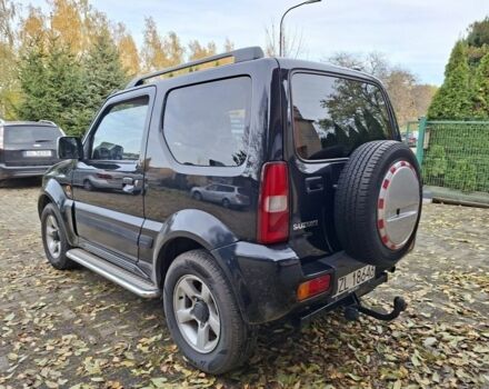 Черный Сузуки Джимни, объемом двигателя 1.5 л и пробегом 130 тыс. км за 1699 $, фото 6 на Automoto.ua