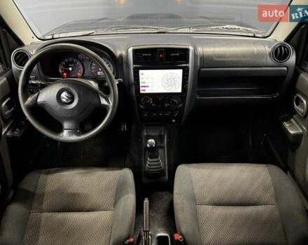 Черный Сузуки Джимни, объемом двигателя 1.33 л и пробегом 168 тыс. км за 12200 $, фото 27 на Automoto.ua