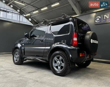 Черный Сузуки Джимни, объемом двигателя 1.33 л и пробегом 168 тыс. км за 12200 $, фото 7 на Automoto.ua