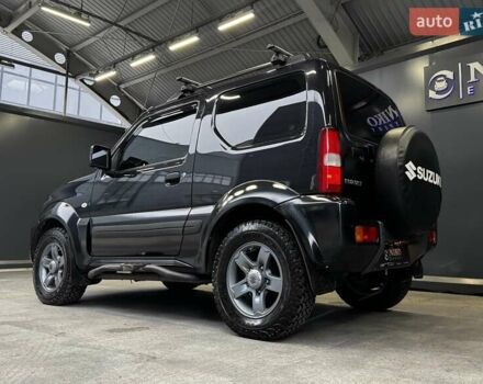 Черный Сузуки Джимни, объемом двигателя 1.33 л и пробегом 168 тыс. км за 12200 $, фото 8 на Automoto.ua