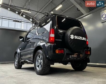 Черный Сузуки Джимни, объемом двигателя 1.33 л и пробегом 168 тыс. км за 12200 $, фото 12 на Automoto.ua
