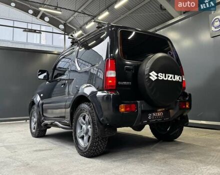 Черный Сузуки Джимни, объемом двигателя 1.33 л и пробегом 168 тыс. км за 12200 $, фото 11 на Automoto.ua
