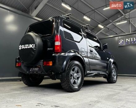 Черный Сузуки Джимни, объемом двигателя 1.33 л и пробегом 168 тыс. км за 12200 $, фото 19 на Automoto.ua