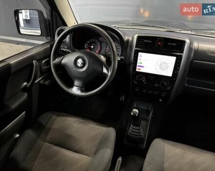 Черный Сузуки Джимни, объемом двигателя 1.33 л и пробегом 168 тыс. км за 12200 $, фото 36 на Automoto.ua