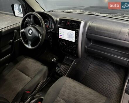 Черный Сузуки Джимни, объемом двигателя 1.33 л и пробегом 168 тыс. км за 12200 $, фото 35 на Automoto.ua