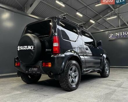 Черный Сузуки Джимни, объемом двигателя 1.33 л и пробегом 168 тыс. км за 12200 $, фото 18 на Automoto.ua