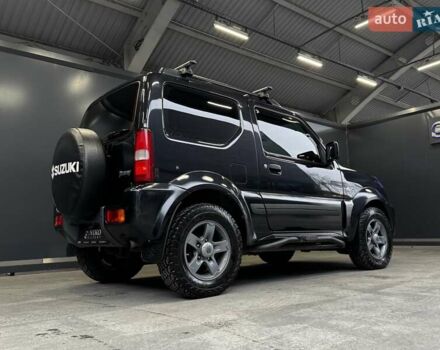 Черный Сузуки Джимни, объемом двигателя 1.33 л и пробегом 168 тыс. км за 12200 $, фото 15 на Automoto.ua