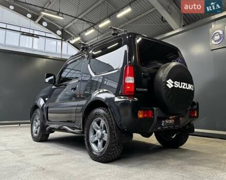 Черный Сузуки Джимни, объемом двигателя 1.33 л и пробегом 168 тыс. км за 12200 $, фото 9 на Automoto.ua