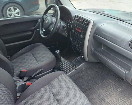 Черный Сузуки Джимни, объемом двигателя 1.3 л и пробегом 60 тыс. км за 13000 $, фото 13 на Automoto.ua