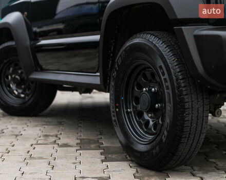 Черный Сузуки Джимни, объемом двигателя 1.46 л и пробегом 21 тыс. км за 23000 $, фото 6 на Automoto.ua