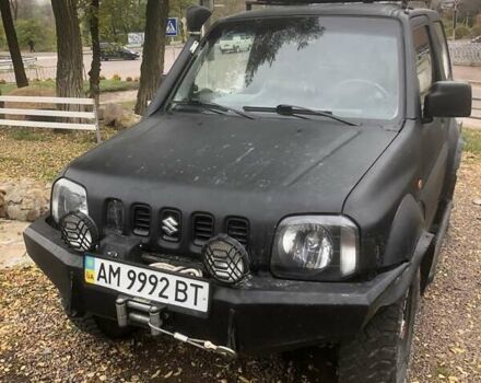 Чорний Сузукі Джімні, об'ємом двигуна 1.3 л та пробігом 164 тис. км за 9900 $, фото 1 на Automoto.ua