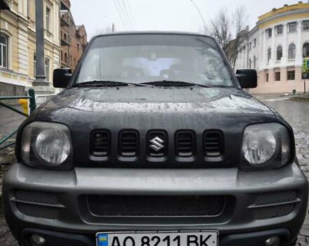 Чорний Сузукі Джімні, об'ємом двигуна 1.3 л та пробігом 164 тис. км за 7450 $, фото 1 на Automoto.ua