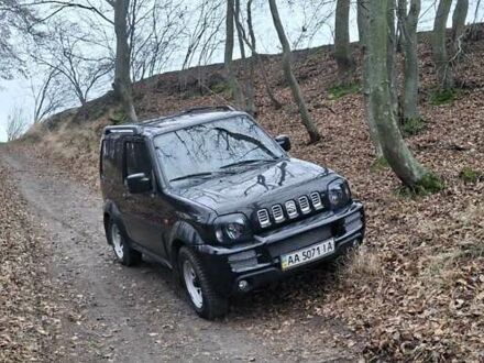 Черный Сузуки Джимни, объемом двигателя 1.3 л и пробегом 225 тыс. км за 6500 $, фото 1 на Automoto.ua