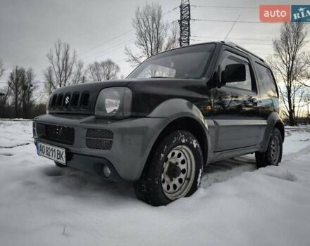 Чорний Сузукі Джімні, об'ємом двигуна 1.3 л та пробігом 163 тис. км за 7700 $, фото 1 на Automoto.ua