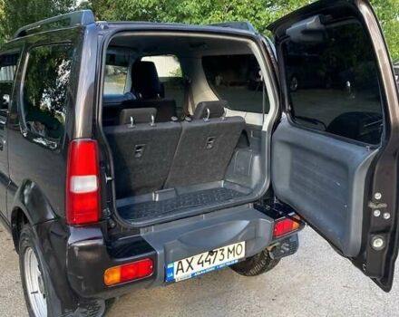 Коричневый Сузуки Джимни, объемом двигателя 1.3 л и пробегом 110 тыс. км за 16000 $, фото 6 на Automoto.ua