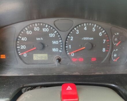 Красный Сузуки Джимни, объемом двигателя 1.3 л и пробегом 205 тыс. км за 5900 $, фото 3 на Automoto.ua