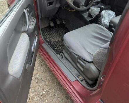 Красный Сузуки Джимни, объемом двигателя 1.3 л и пробегом 185 тыс. км за 5999 $, фото 3 на Automoto.ua