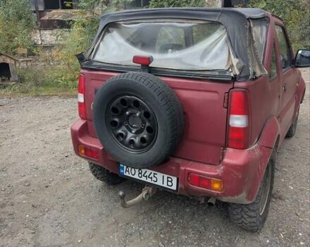 Красный Сузуки Джимни, объемом двигателя 1.3 л и пробегом 185 тыс. км за 5999 $, фото 6 на Automoto.ua