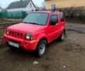 Красный Сузуки Джимни, объемом двигателя 1.3 л и пробегом 198 тыс. км за 7900 $, фото 1 на Automoto.ua