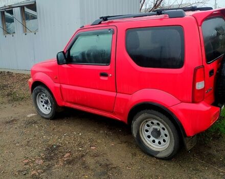 Красный Сузуки Джимни, объемом двигателя 1.3 л и пробегом 198 тыс. км за 7900 $, фото 1 на Automoto.ua