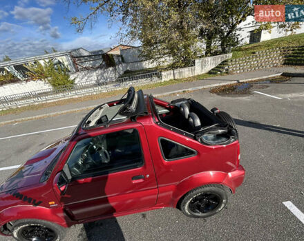 Сузуки Джимни 2006 в Киеве на Automoto.ua Красный Сузуки Джимни, объемом двигателя 1.5 л и пробегом 221 тыс. км за 12000 $, фото 23 на Automoto.ua