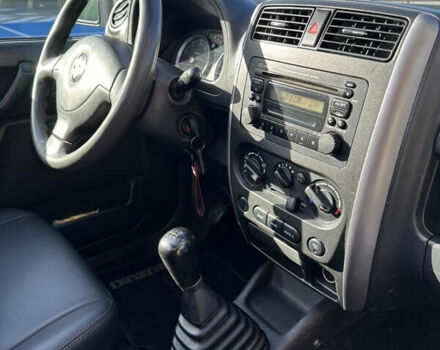 Сузуки Джимни 2006 в Киеве на Automoto.ua Красный Сузуки Джимни, объемом двигателя 1.5 л и пробегом 221 тыс. км за 12000 $, фото 12 на Automoto.ua